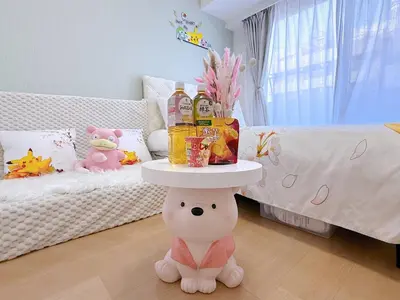 a table on top of a table in a room at Cute Anime-Style Room Near Kinshicho Station in Tokyo