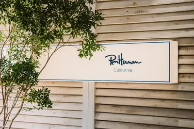 a sign on the side of a building at SEADINERS VILLA AOYAMA Tokyo First Metropolis Villa Pool Sauna BBQ in Tokyo