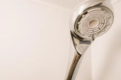 a close up of a silver toothbrush at SEADINERS VILLA AOYAMA Tokyo First Metropolis Villa Pool Sauna BBQ in Tokyo