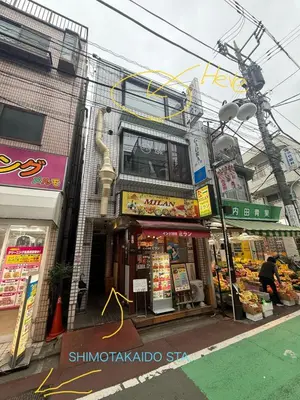 a store on a street corner in a city at Villa TOKYO SHIMOTAKAIDO Nest in Tokyo