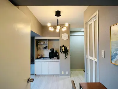 a kitchen with a table and a dining room at \u30e9\u30a4\u30aa\u30f3\u30ba\u30d7\u30e9\u30b6\u65b0\u5bbf901 in Tokyo
