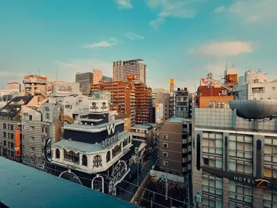 a view of a city from the top of a building at \u30e9\u30a4\u30aa\u30f3\u30ba\u30d7\u30e9\u30b6\u65b0\u5bbf901 in Tokyo