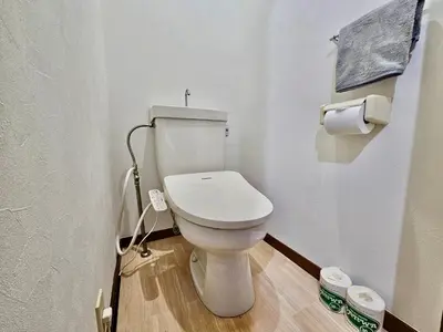 a bathroom with a white toilet in a room at Credo House Shin-Okubo in Tokyo