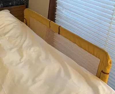 a bed in a room with a window at En House Asakusa in Tokyo
