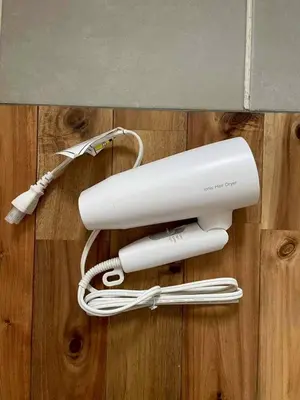 aintendo wii game system sitting on top of a table at Great location 8 minutes on foot from Higashi-Shinjuku Station and 1 stop from Shinjuku Station! Accommodates up to 11 people Wi-Fi available Shibuya, Asakusa, Ikebukuro in Tokyo