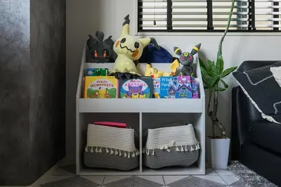 a shelf with toys on it in a room at Skytree View Riverside Terrace in Tokyo