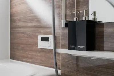a room with a counter with two faucets on a wall at Skytree View Riverside Terrace in Tokyo
