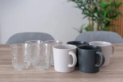 a group of cups and glasses on a table at Tany House 1F sky tree 20 minutes, maximum 8 people, 3 bedrooms, new interior in Tokyo