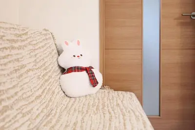 a stuffed rabbit is sitting on a hammock at 3 min JR Near Tokyo Skytree Asakusa Shinjuku Sea Heim in Tokyo