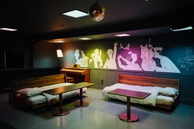 a bedroom with two beds and a wall mural at MUSICIAN AIR 0014 kyojima in Tokyo