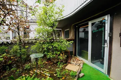 a front door of a house with a garden at MUSICIAN AIR 0014 kyojima in Tokyo