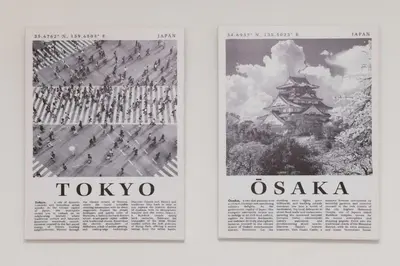 two posters of tokyo and osaka on a wall at konomi \u4e8c\u5341\u4e8c\u756a\u9928 \u83ca\u5ddd\u5f92\u6b693\u5206 in Tokyo