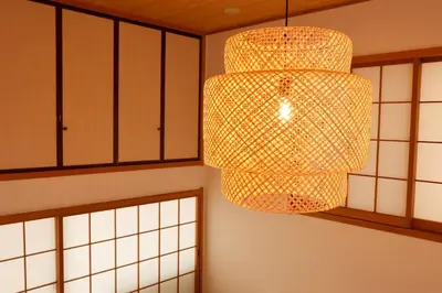 a large chandelier hanging in a room with cabinets at \u30cf\u30a4\u30af\u30ec\u30b9\u30c8\u516b\u5e83 in Tokyo