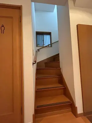 a staircase in a house with a window at \u30cf\u30a4\u30af\u30ec\u30b9\u30c8\u516b\u5e83 in Tokyo
