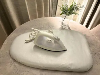 a white phone sitting on top of a table at FARE Akihabara - Stylish Premium Studio 8min from Station 202 in Tokyo