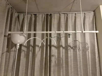 a shower curtain with hooks in a bathroom at FARE Akihabara - Stylish Premium Studio 8min from Station 202 in Tokyo
