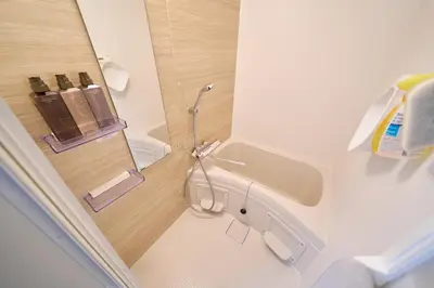 a small bathroom with a toilet in a room at Serendipity Asakusa in Tokyo