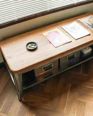 a wooden table sitting on top of a table at Hostel Hana An in Tokyo