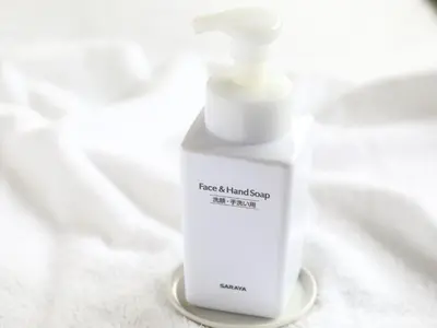 a white bottle of hand soap sitting on a table at APA Hotel Roppongi Ekimae in Tokyo