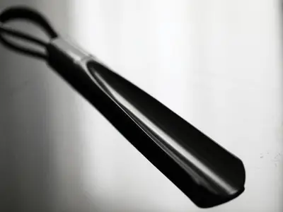 a pair of black handles on a white surface at APA Hotel Roppongi Ekimae in Tokyo