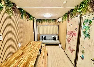 a room with a table and a couch in it at Shimbashi,3BR,2Baths,8ppl in Tokyo