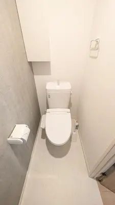 a bathroom with a white toilet in a stall at Brand New Apt! 7 Mins to Ikebukuro, Local Vibe Rino Verdi in Tokyo