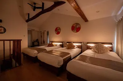 a bedroom with two beds with lights on the wall at Ginza Stay Tsukishima Station 1-minute walk, Ginza, Shinjuku, Tsukiji Market tram direct, supermarket, next to the canal, Tokyo Bay stroll in Tokyo