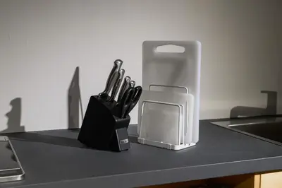 a counter top with a knife block with knives at Zen Premium Suite Newly Renovated Luxury Home 2King Beds Near Shinjuku in Tokyo