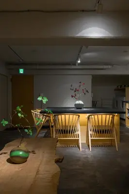 a room with two chairs and a table with plants at Zen Premium Suite Newly Renovated Luxury Home 2King Beds Near Shinjuku in Tokyo