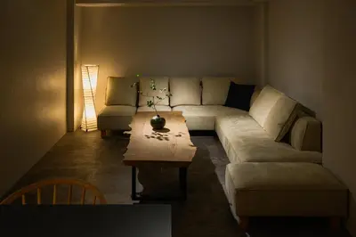 a living room with a couch and a coffee table at Zen Premium Suite Newly Renovated Luxury Home 2King Beds Near Shinjuku in Tokyo
