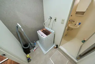 a small bathroom with a toilet and a sink at 23Maison-J\u5927\u4e45\u4fdd\u99c5\u8fd1 in Tokyo