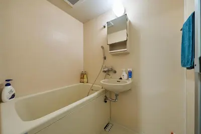 a bathroom with a sink and a bath tub at 23Maison-J\u5927\u4e45\u4fdd\u99c5\u8fd1 in Tokyo