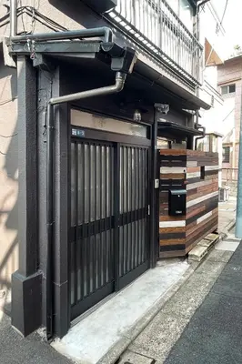 a gate on the side of a building at Wa Modern stay Mukoujima Skytree Asakusa 10min in Tokyo