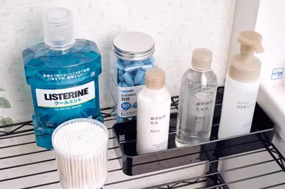 a rack with bottles of detergent and other liquids at Tokyo Tower Roppongi walk 4 bed, Direct bus to Shibuya in Tokyo