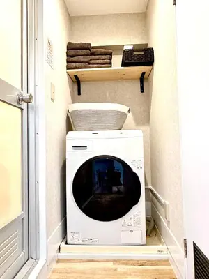 a washer and dryer in a small room at #403 Tokyo Ryogoku Hokusai Katsushika in Tokyo