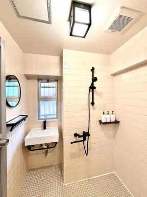 a bathroom with a sink and a shower at #403 Tokyo Ryogoku Hokusai Katsushika in Tokyo
