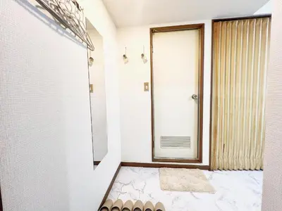 a bathroom with a shower and a glass door at \u6c60\u888b\u99c5\u96fb\u8eca4\u5206 2LDK a2 in Tokyo