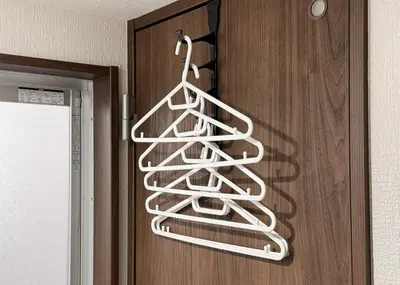 a white metal christmas tree hanging on a door at Cozy 1BR Apt in Asakusa-8 min walk Naka Okachimachi station in Tokyo