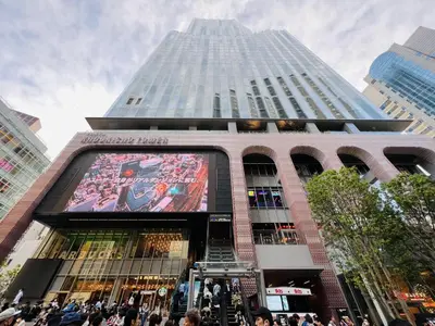 a large building with a large screen in front of it at Shinjuku Station kabukicho 2minutes big House in Tokyo