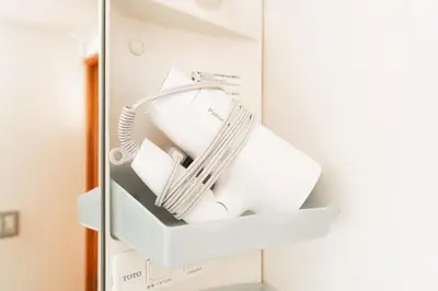 a white appliance is in a white refrigerator at mukai Apt - 5 min walk to Itabashi subway 1stop 3min to Ikebukuro in Tokyo