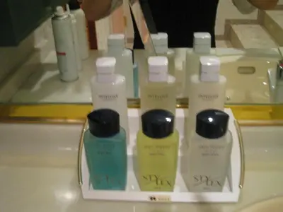 a group of four bottles sitting on a counter at Meguro Emperor (Adult Only) in Tokyo