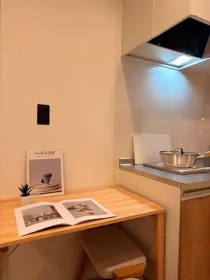 a desk in a kitchen with a bowl on a counter at ISSHUKU Noma \u5317\u65b0\u5bbfI -203 Triple Room in Tokyo