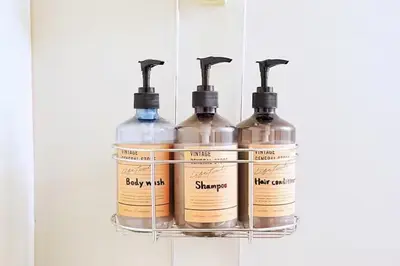 a group of four alcohol bottles on a shelf at 10 minutes to Shibuya by train, 2 beds, great access, Yoyogi Uehara in Tokyo