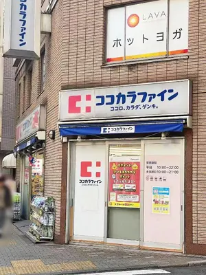a store with signs on the side of a building at \u6696\u71c8 DANTO inn 5F in Tokyo