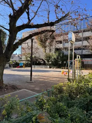 an empty parking lot in front of a building at ISSHUKU NOMA\u6c60\u888bII 101 - Spacious Room for 5 Guests in Tokyo