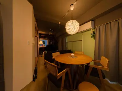 a dining room with a table and chairs at 4min Shibuya Sta,3min Shinsen Sta,Central Shibuya,family-friendly,Switch, movies, Wi-Fi in Tokyo
