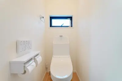 a bathroom with a white toilet and a sink at House no7 in Tokyo