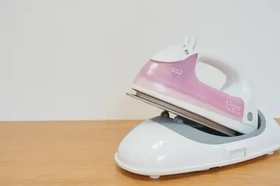 a pink and white iron sitting on a table at House no7 in Tokyo