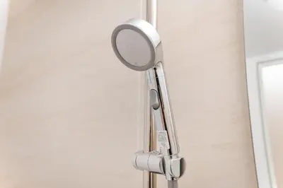 a magnifying mirror hanging on a wall at House no7 in Tokyo
