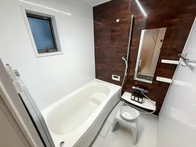 a bathroom with a tub and a toilet and a sink at Central Tokyo Skytree Heven in Tokyo